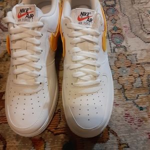 A brand new pair of Nike Air Force ones mids.